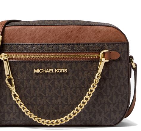 michael kors logo drawstring large crossbody brown|Michael Kors Crossbody purse.